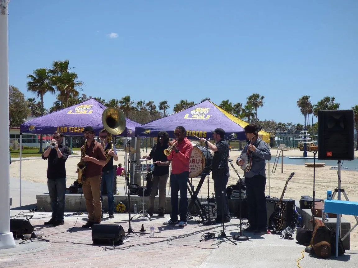 The band under LSU tents at the Redondo Beach crawfish boil