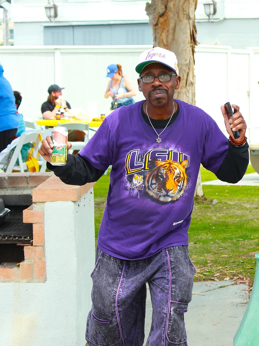 Charles in an LSU shirt at the chapter crawfish boil
